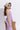 knitted schiffli sleeveless ruched slit peplum top and flared pant set- Lilac