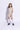 Sleeveless striped crop blazer with matching skort and solid crop top set-Beige & White