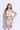 Sleeveless striped crop blazer with matching skort and solid crop top set-Beige & White
