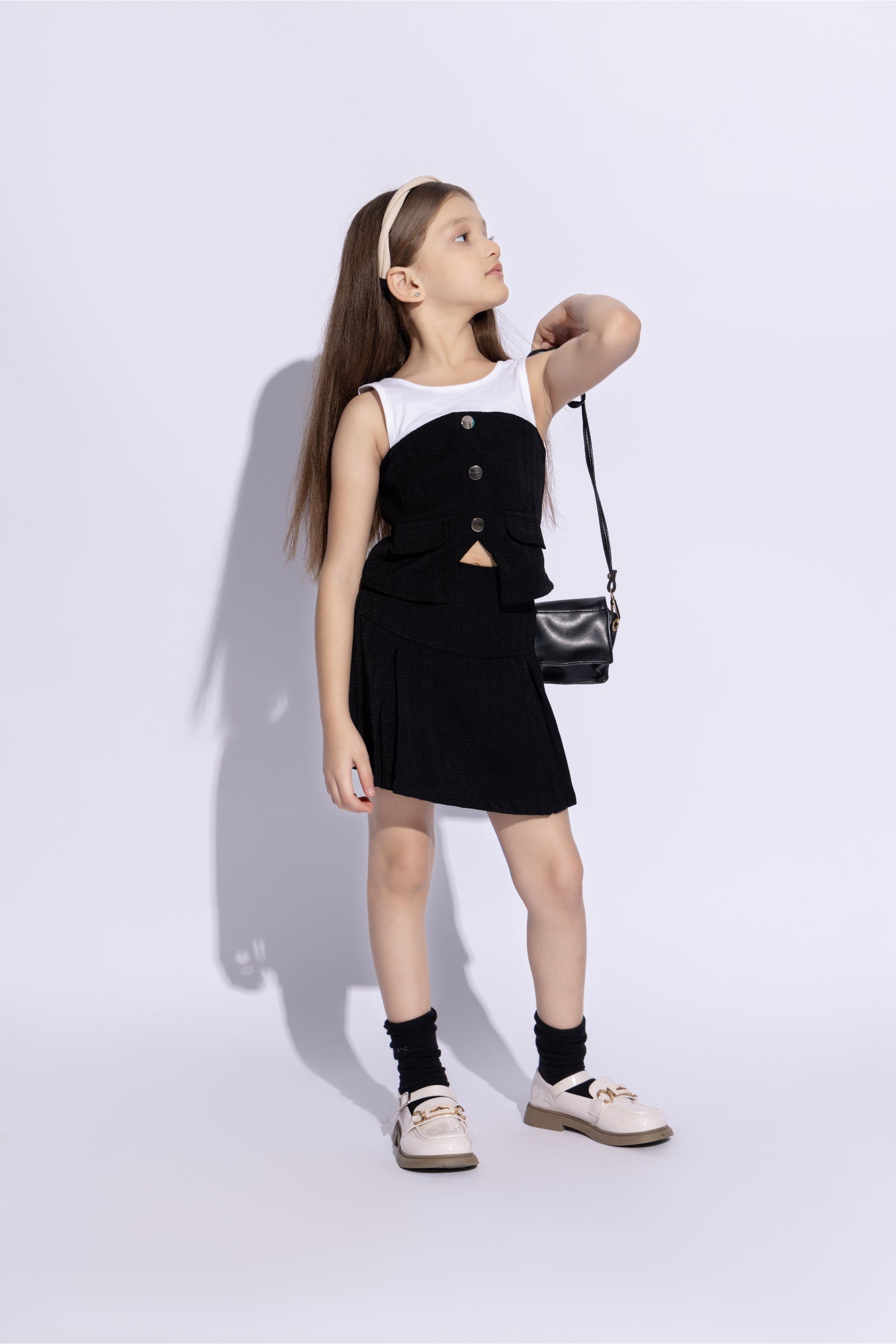 sleeveless texture and cotton jersey button detail top and pleated skirt set- Black & White