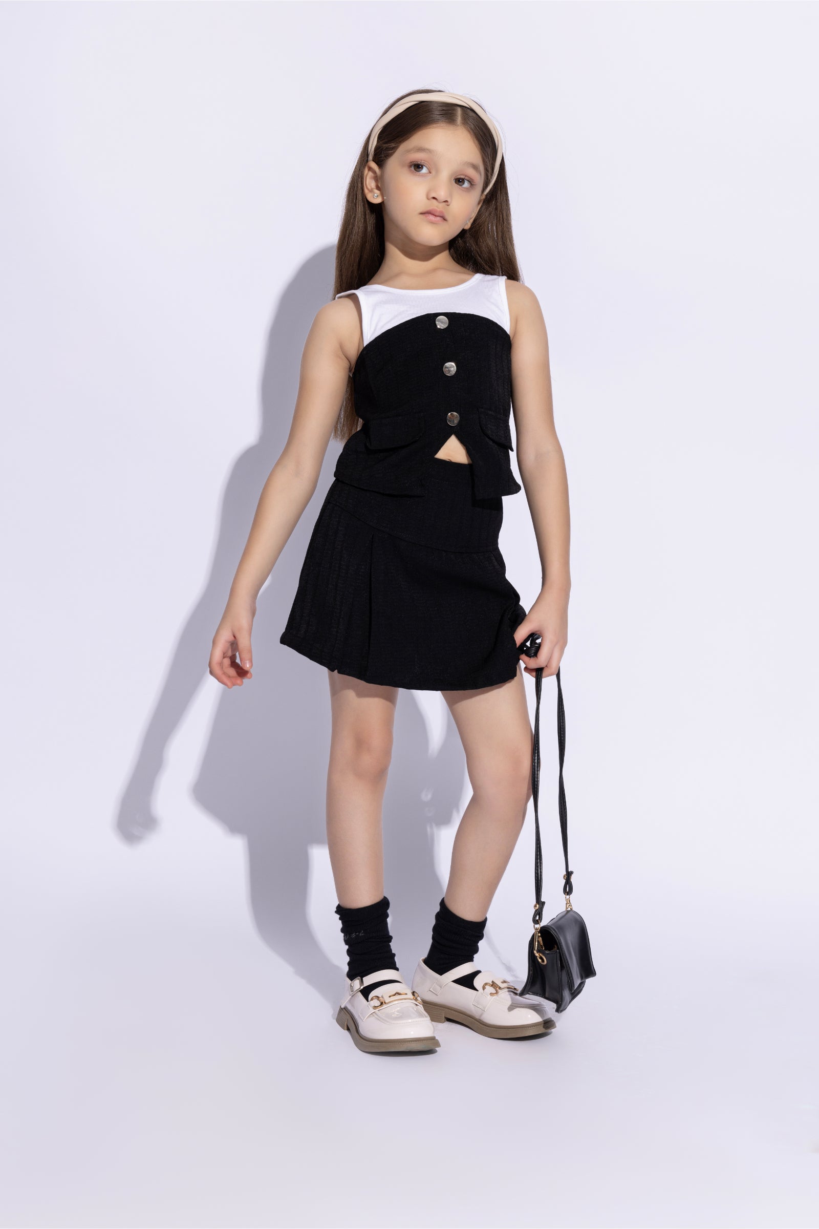 sleeveless texture and cotton jersey button detail top and pleated skirt set- Black & White