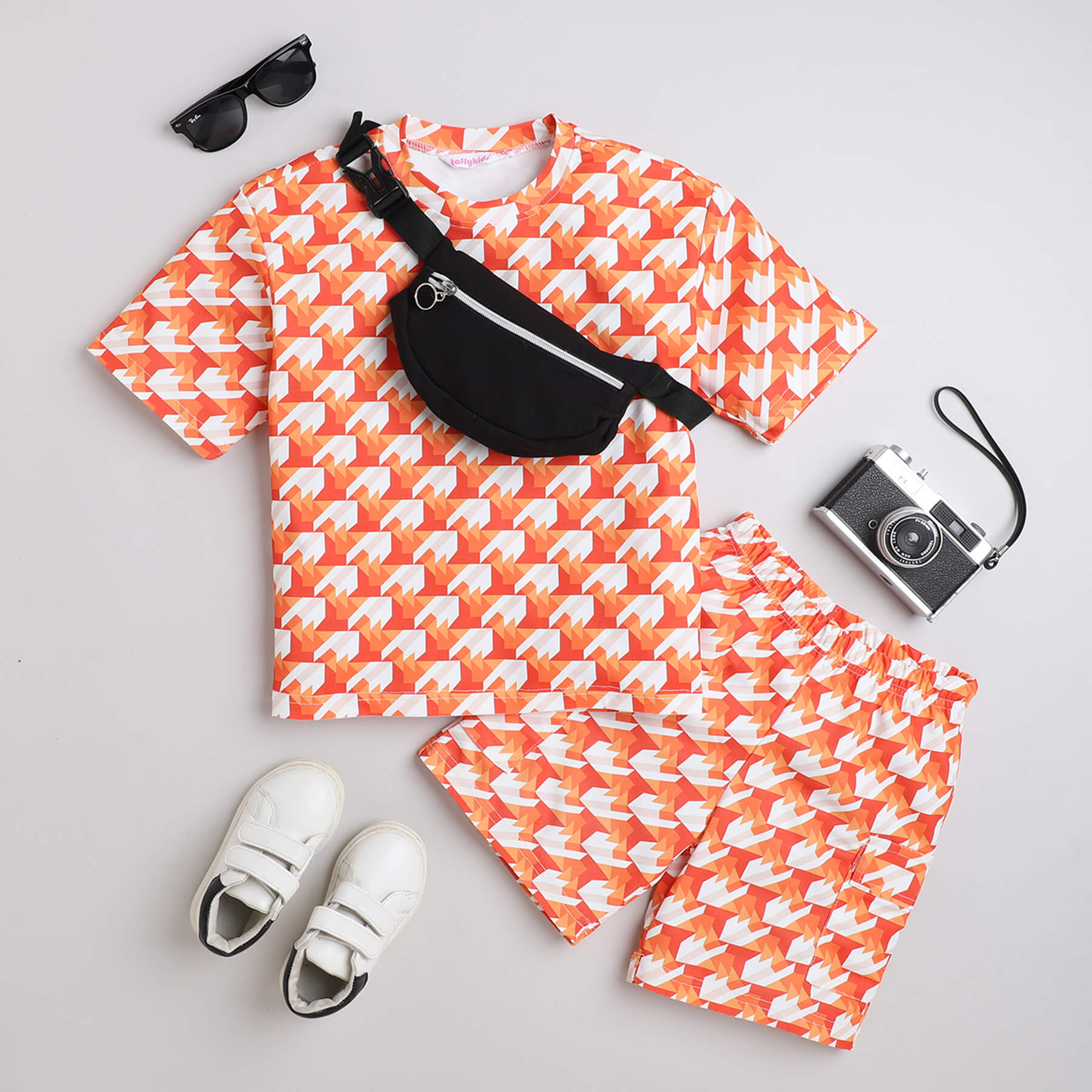 Taffykids houndtooth printed half sleeve Oversized tee and Shorts co-ord set with Waist bag-Orange/Black