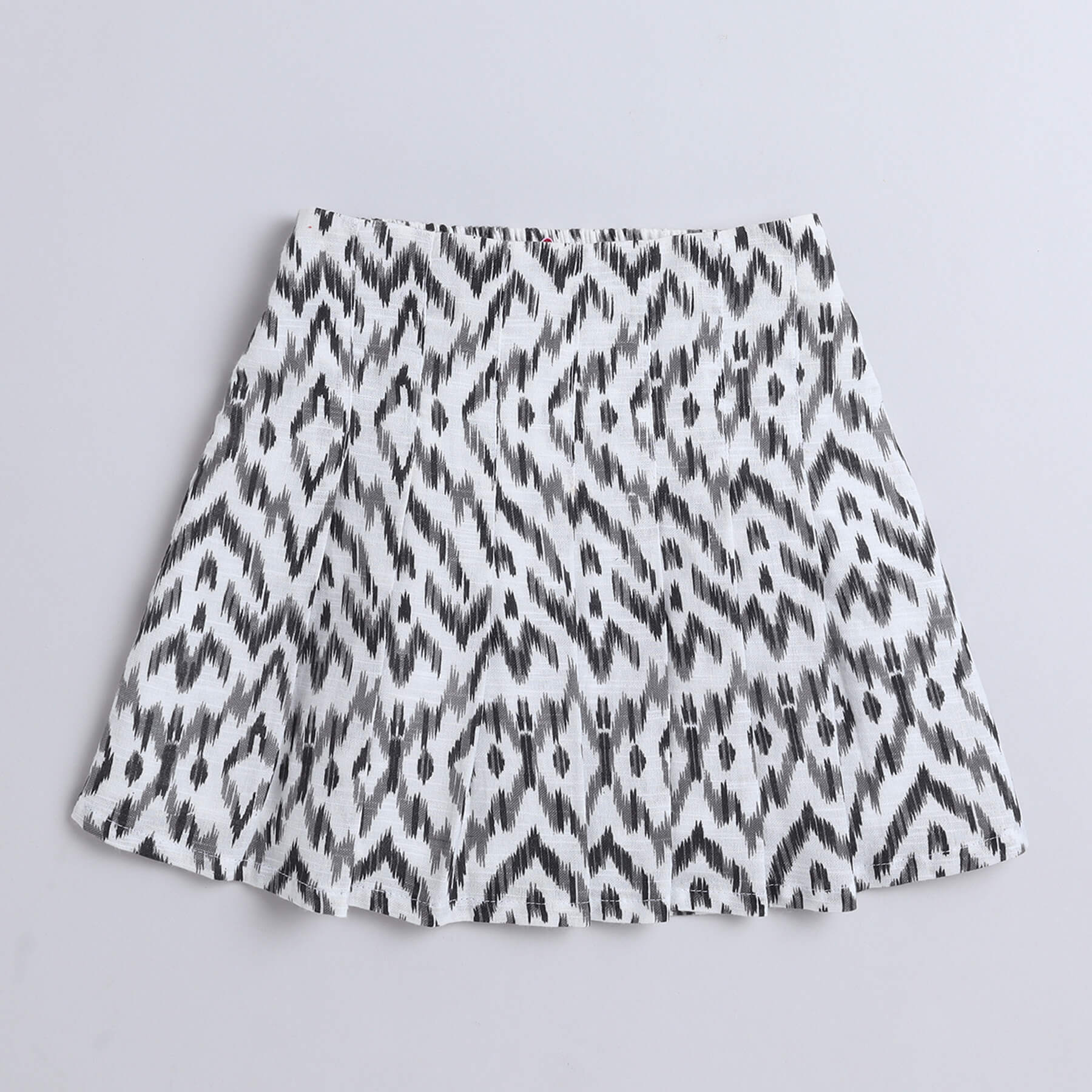 Taffykids linen ikkat printed  sleeveless wrap blazer crop top with matching pleated skirt set-Off white