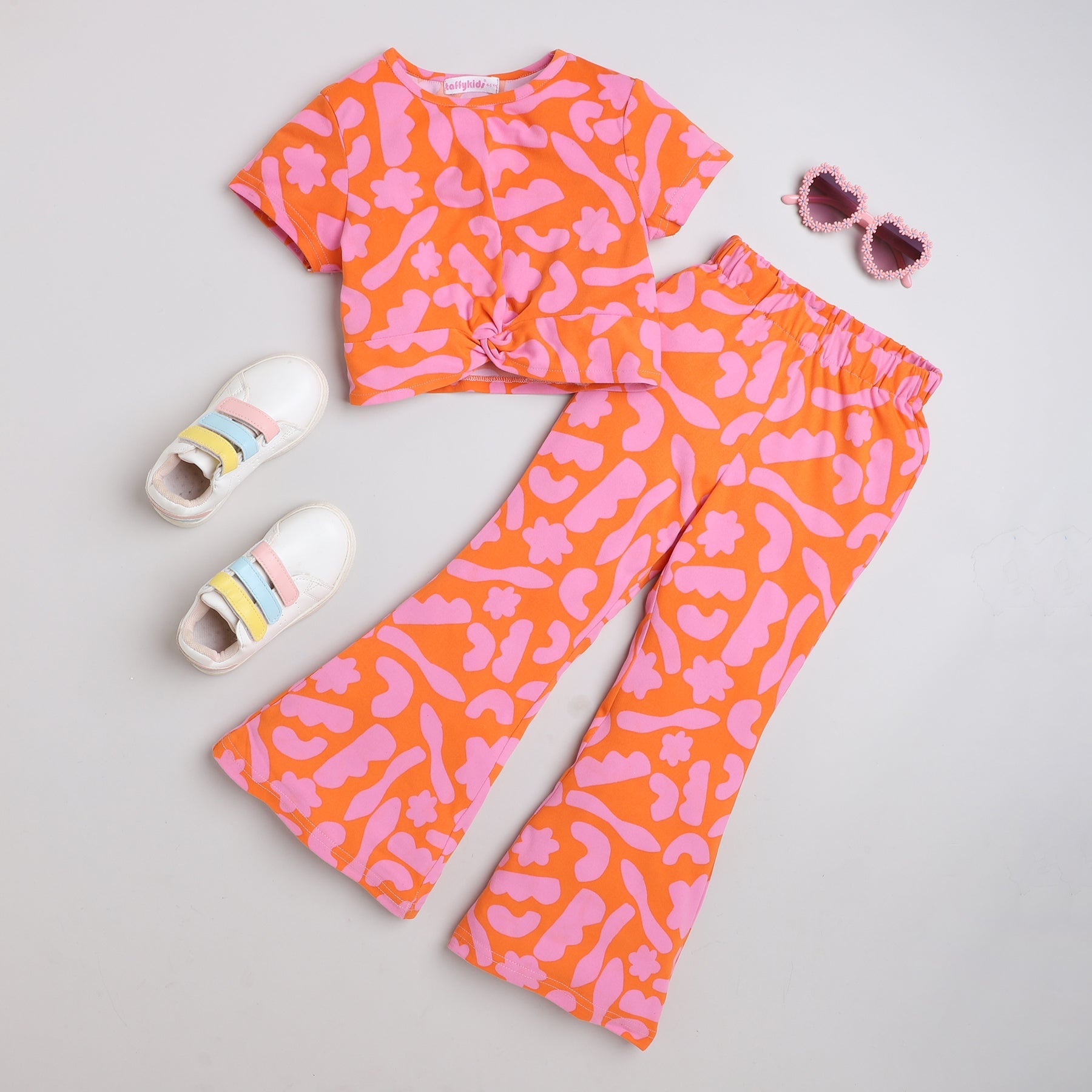 Shop Taffy Abstract  Printed Half Sleeves Twisted Front Crop Top With Matching Bell Bottom Pant Set-Orange/Pink Online