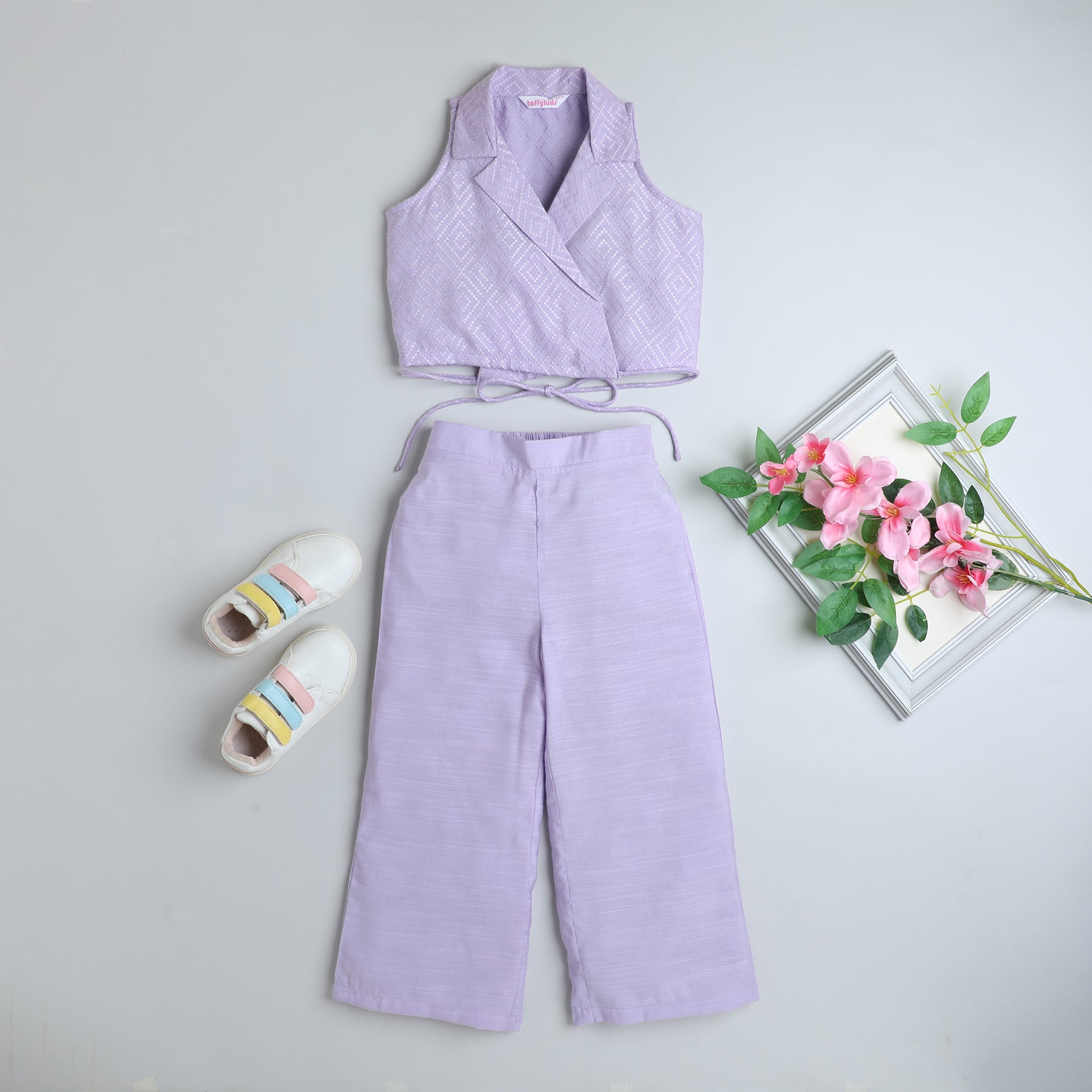 Dobby weaved sleeveless waist tie-up crop blazer and matching solid straight fit pant co-ord set- lavender