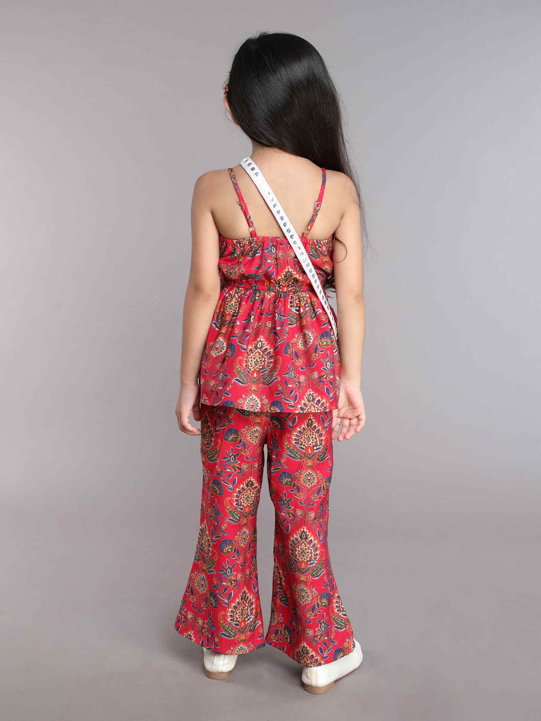 Floral printed peplum top with matching pant set with crossover bag - Pink