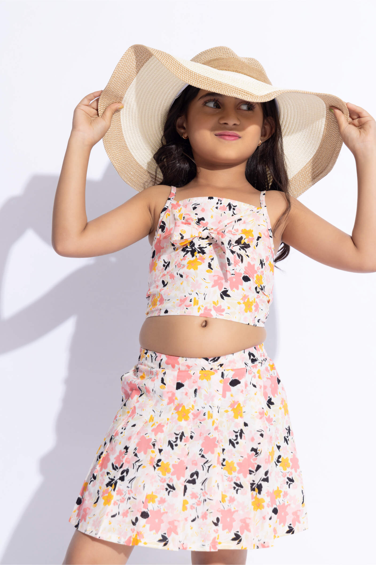 100% cotton sleeveless floral printed front tie-up singlet crop top with Pleated skirt- White & multi