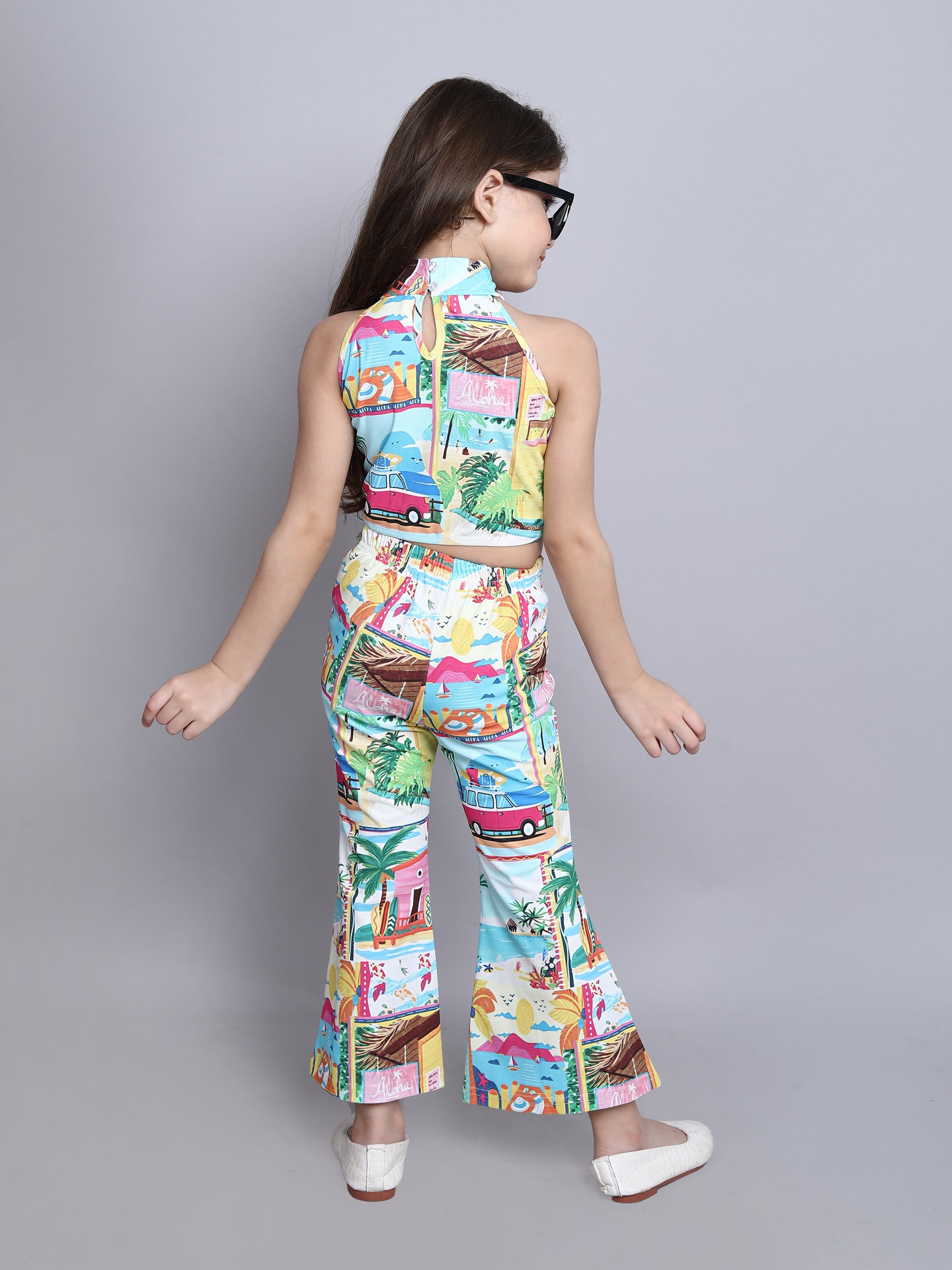 graphic printed sleeveless halter neck crop top and matching V waist bell bottom pant set-Multi