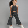 sleeveless all over dots printed halter neck crop top & flared pant set-Black