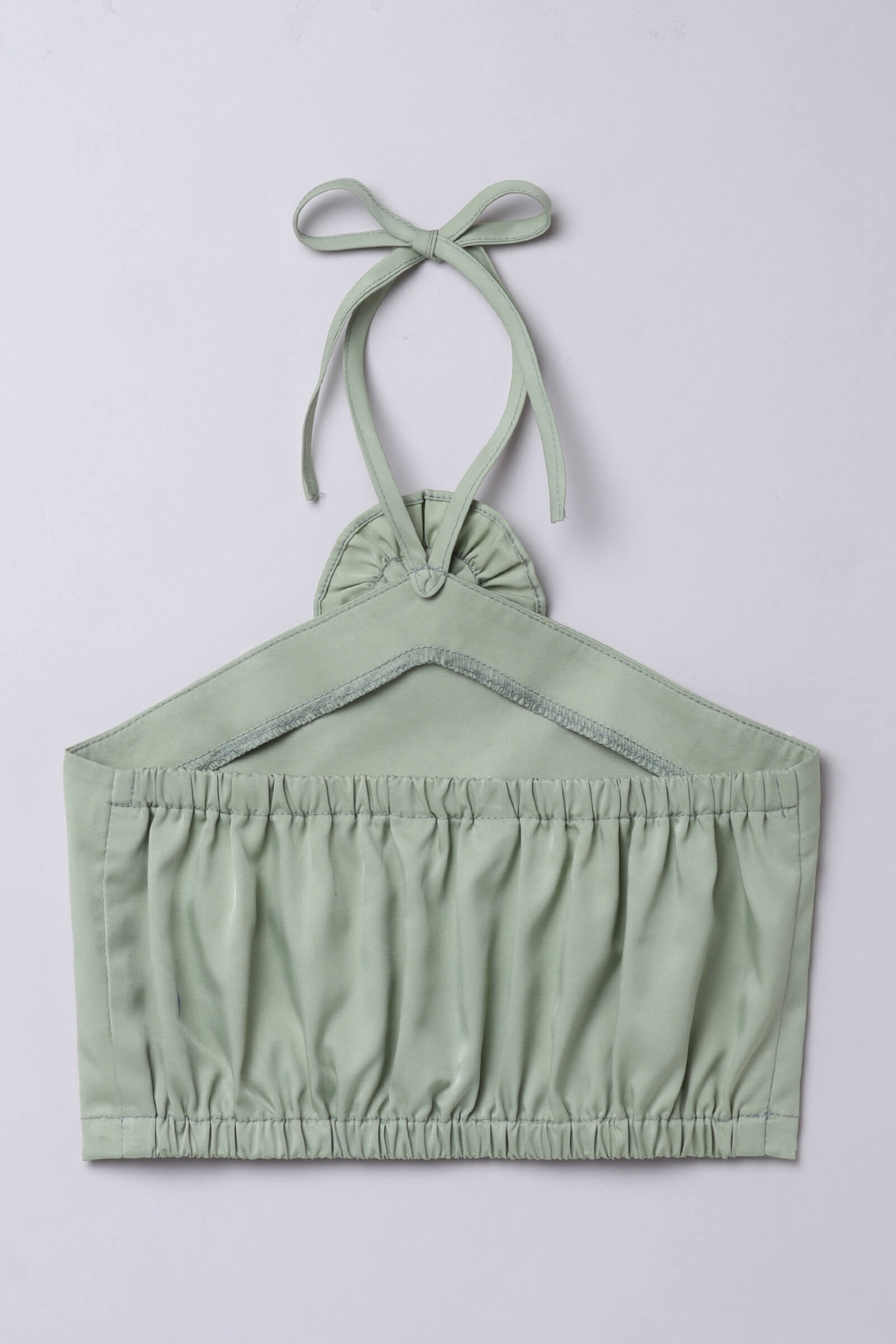 Satin sleeveless flower detailed halter neck neck tie-up crop top - Green