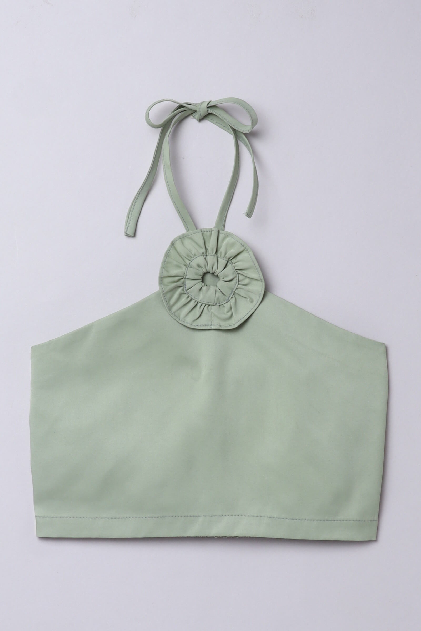 Satin sleeveless flower detailed halter neck neck tie-up crop top - Green