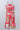 Sleeveless floral printed chain detail crop top and wrap pant co-ord set- Coral Red & Multi