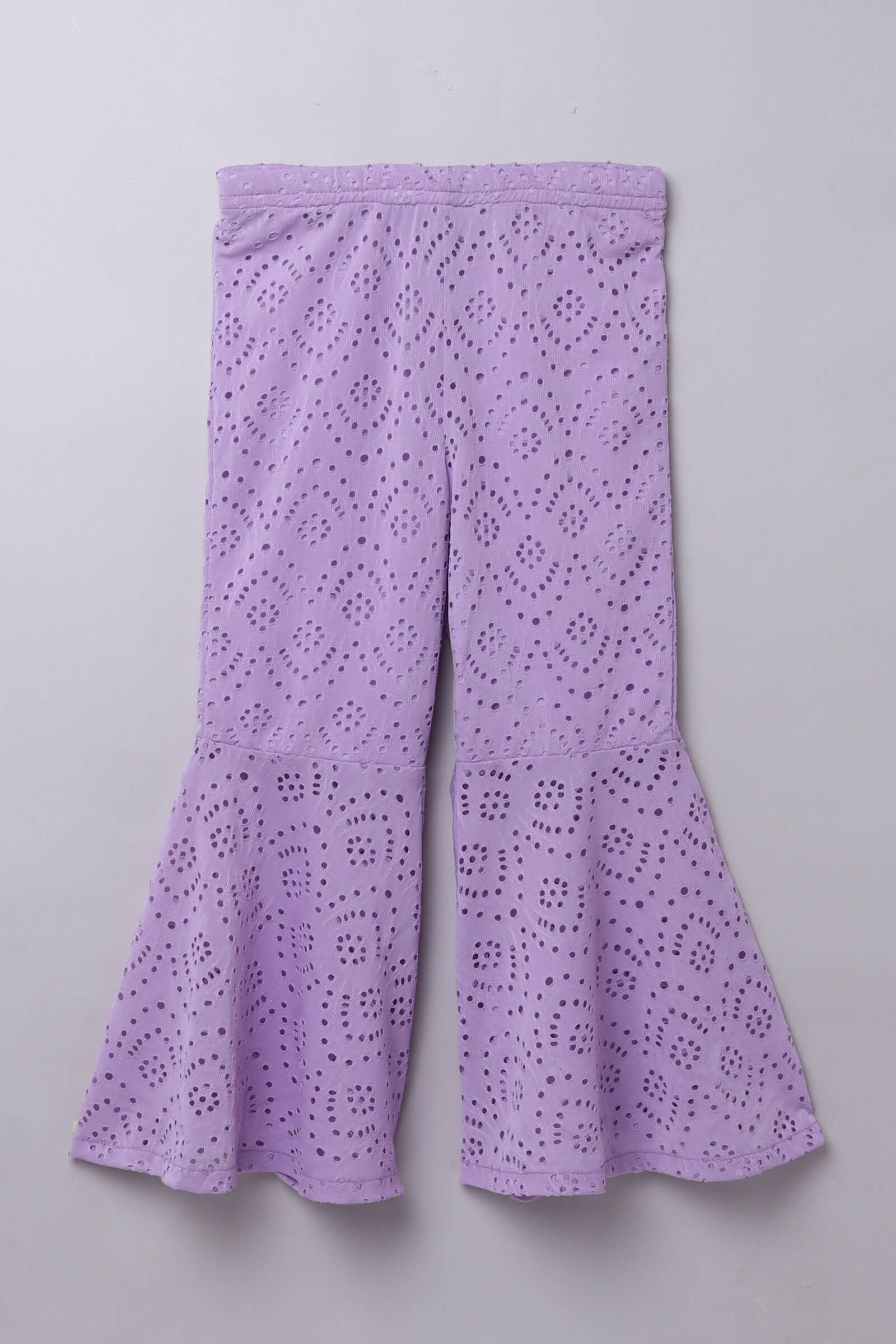 knitted schiffli sleeveless ruched slit peplum top and flared pant set- Lilac