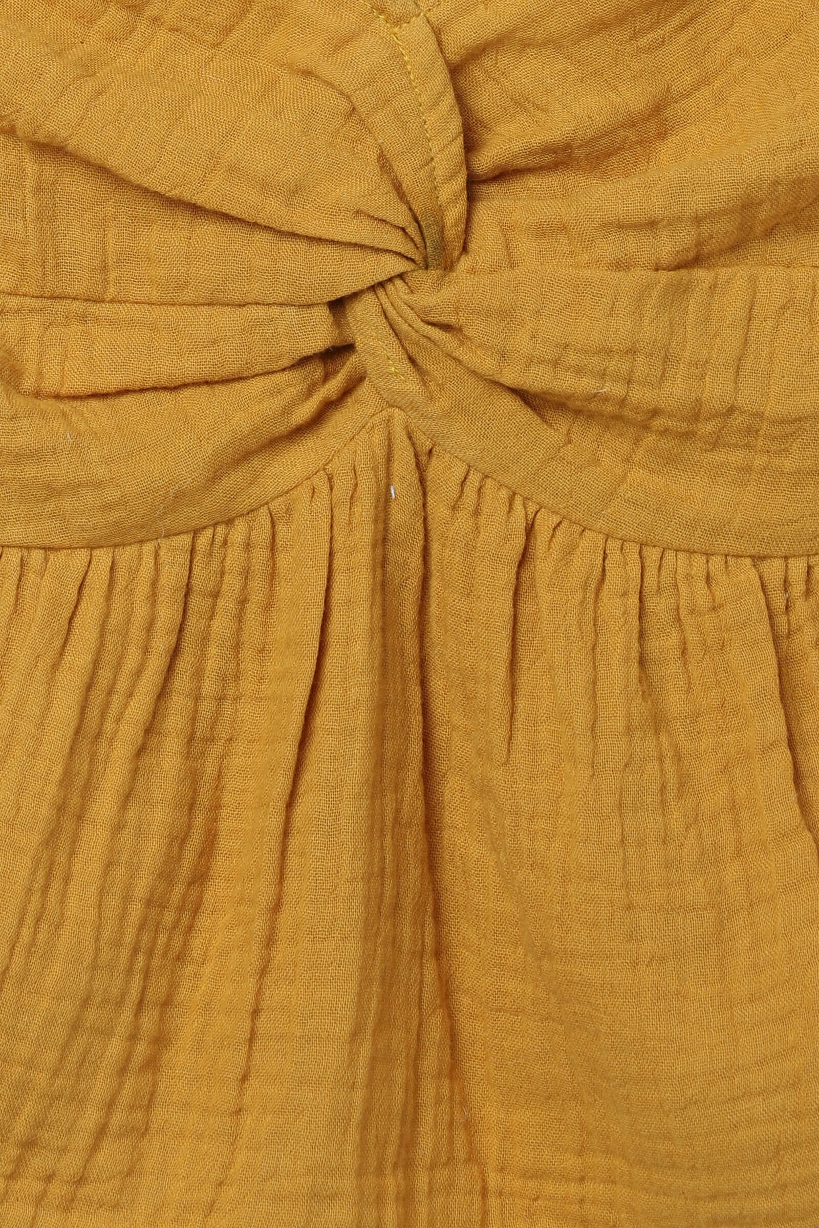 100% cotton woven sleeveless Twist detail peplum top-Mustard yellow