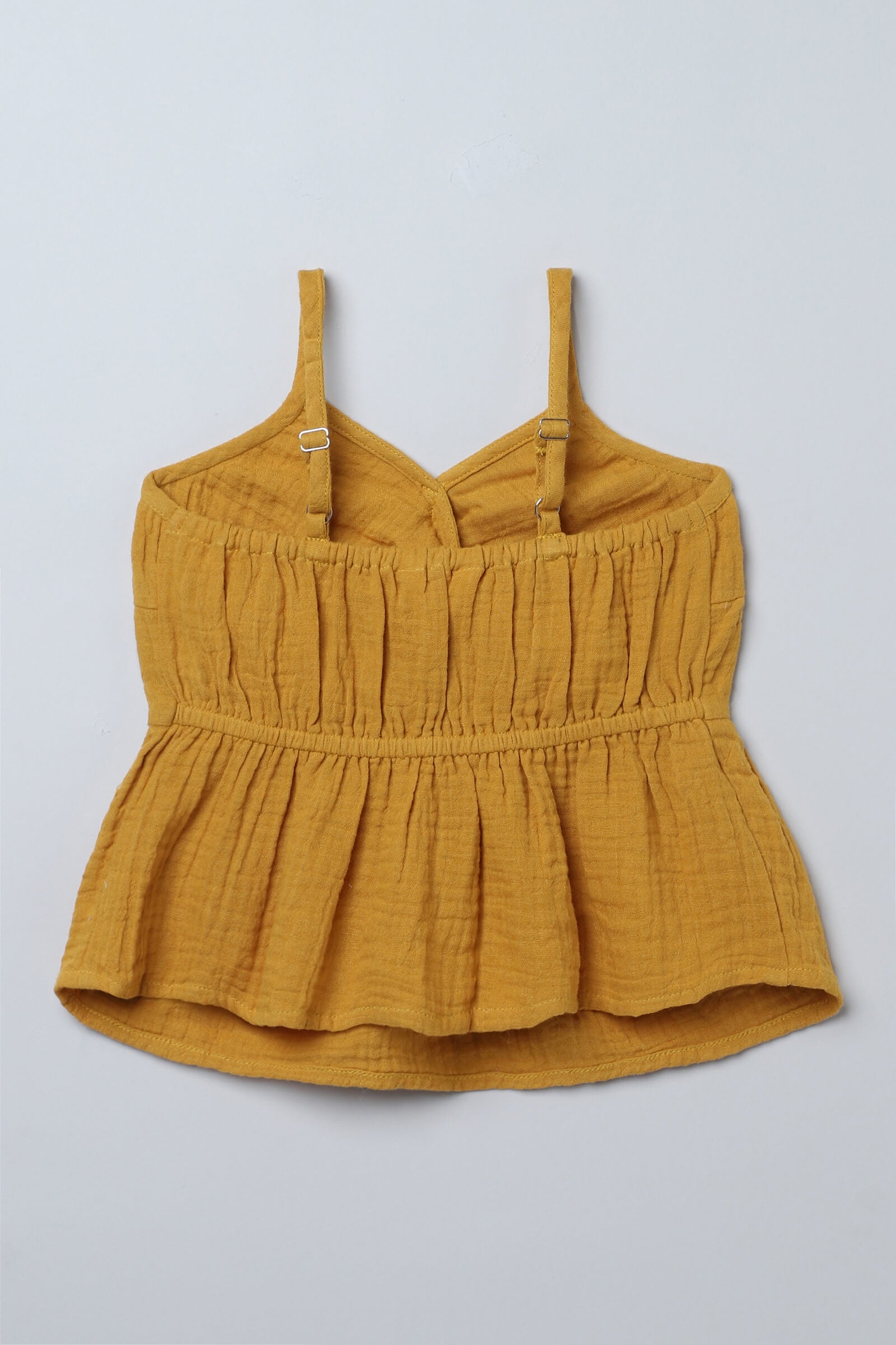 100% cotton woven sleeveless Twist detail peplum top-Mustard yellow